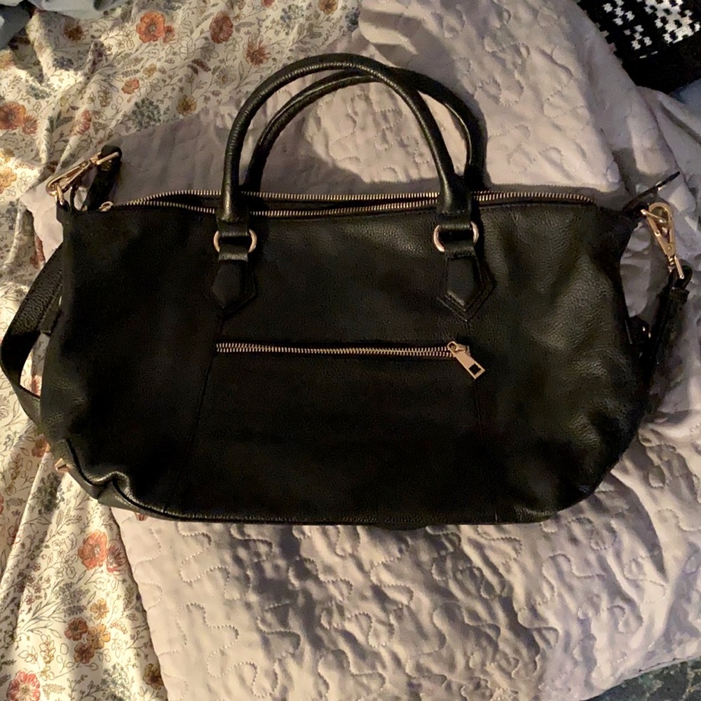 Black Ora Delphine handbag.  Beautiful condition.  A classic.  Timeless.
